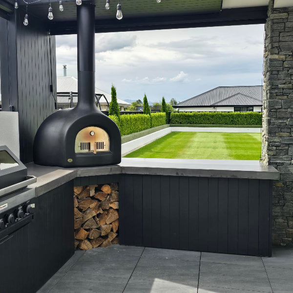 Outdoor kitchen with a pizza oven