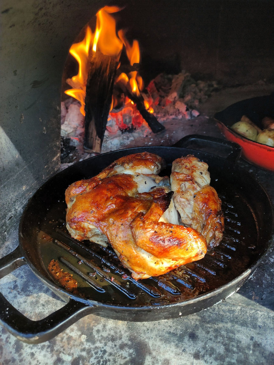 Roast chicken cooked in a Kiwi Pizza Oven
