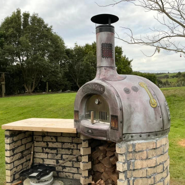 Outdoor brick oven with stone base
