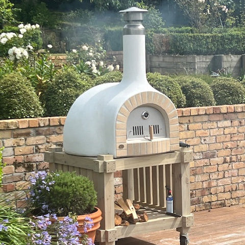 pizza oven on a portable wooden stand