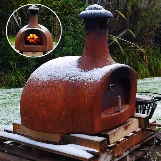 Rust Colour Pizza Oven During Snow